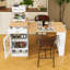Îlot de cuisine avec table de salle à manger extensible, rangement double-face, prise de courant et tablettes réglables-208941651