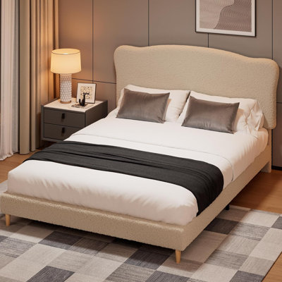 Structure de lit grand tapissier avec tête de lit arrondie, profil bas, beige
