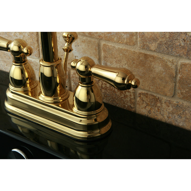 Kingston Brass Restoration Two-Handle 3-Hole Deck Mount 4" Centerset Bathroom Faucet with Plastic Pop-Up, Polished Brass