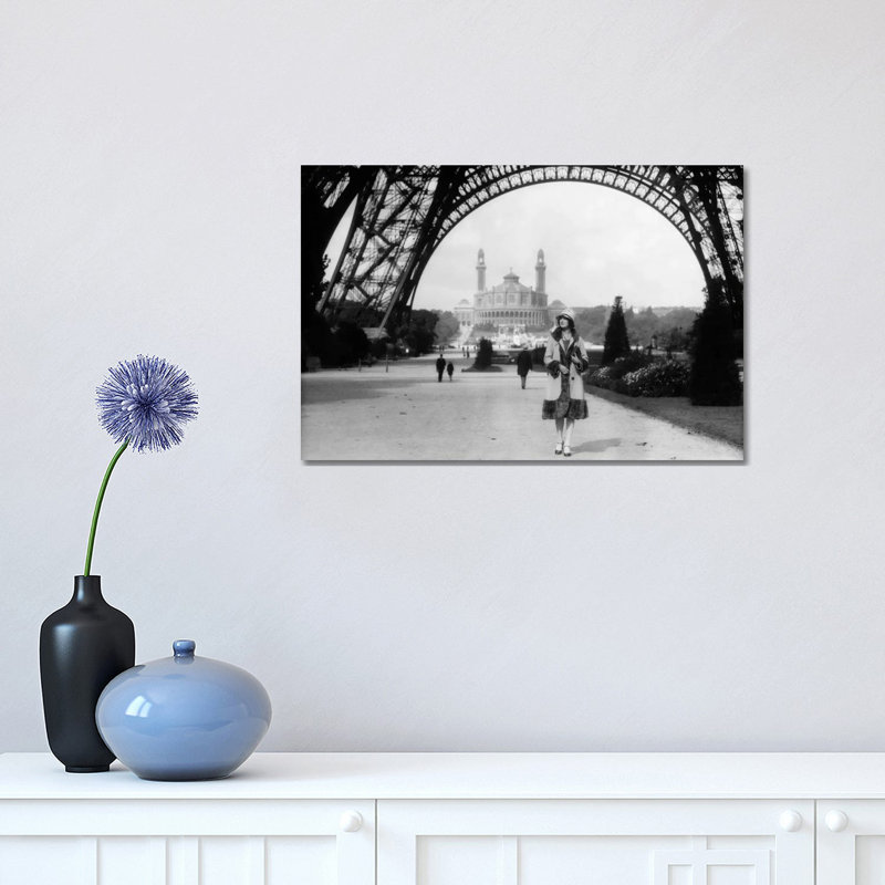 1920s Woman Walking Under The Eiffel Tower With The Trocadero In Background Paris France by Vintage Images - Wrapped Canvas Print