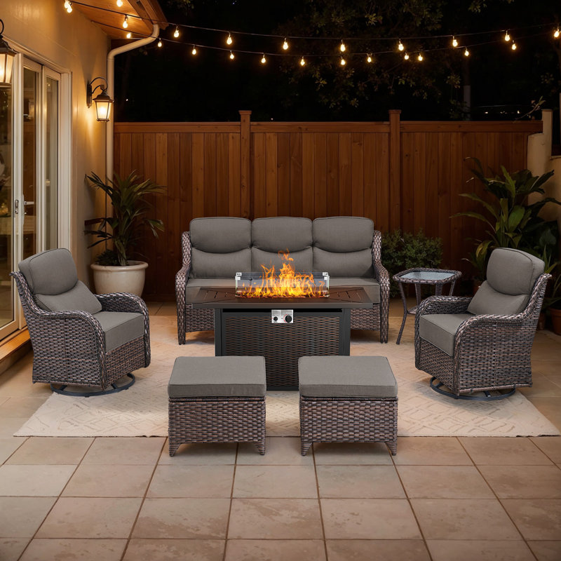 Abbey 7-Piece Wicker Patio Furniture Sofa Set With Fire Pit Table, 6-Inch Thick Cushion Swivel Glider Chairs & Ottomans, 7
