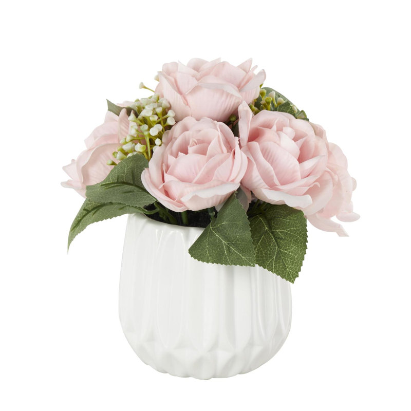 Cole et feuillage naturel en tissu gris avec feuilles vertes et vase rond en céramique