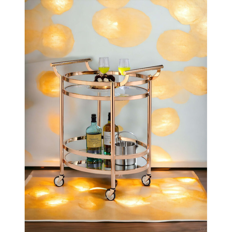 Chariot de service en verre transparent et finition or rose