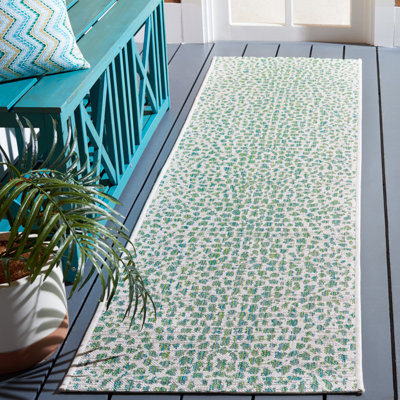 Animal Print Ivory/Green Indoor/Outdoor Area Rug