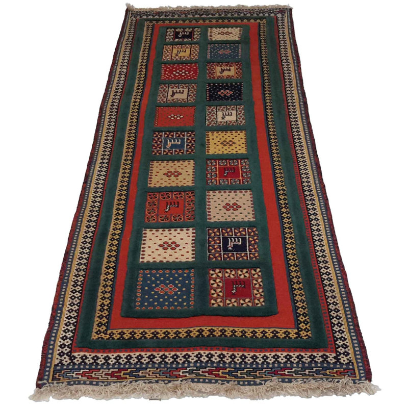 Aryiel Oriental Area Rug in Green