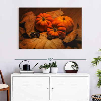 Pommes de pin et citrouilles Yarlin