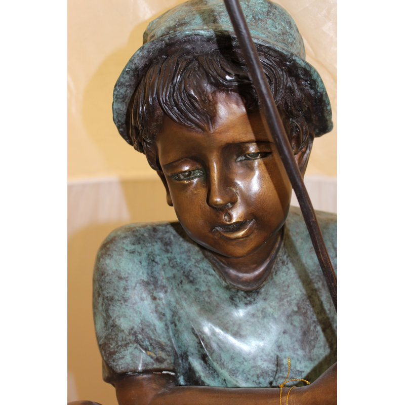 Boy Sitting on a Tree and Fishing Bronze Statue -  Size: 34"L x 28"W x 64"H. 
