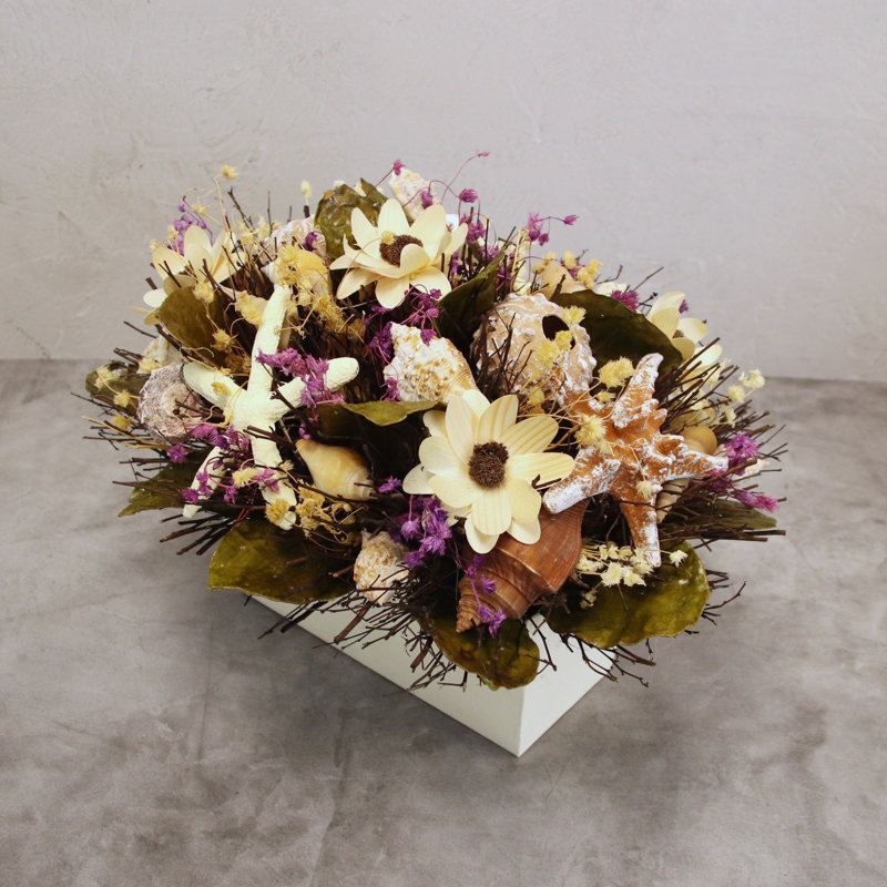Arrangement floral de coquillage mélangé