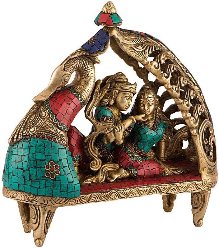 Radha Krishna assise sur un paon