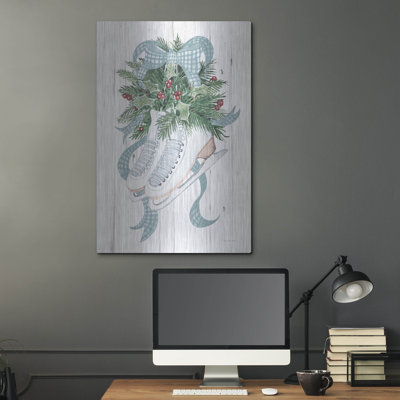 Art mural en métal The Holiday Aisle® «Holiday Sports Ice Skates» par Kathleen Parr