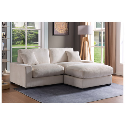 Canapé d'angle modulaire 4 places avec 2 poufs et coussins, revêtement en velours côtelé, couleur crème, idéal pour le salon.