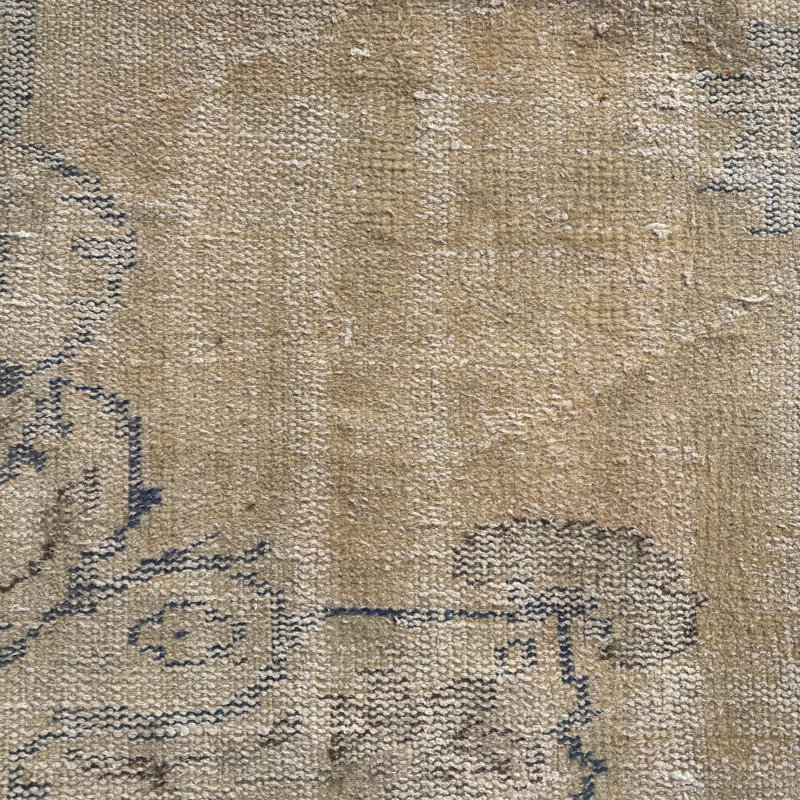 Tapis turc rétro de style scandinave neutre idéal pour les petits espaces et comme tapis de porte élégant dans des tons de brun chaud