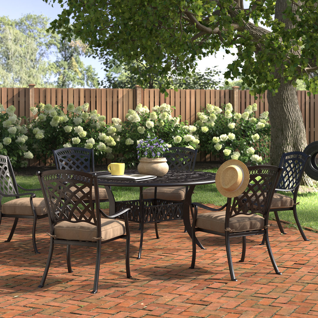 Wildermuth 6 - Person Metal Patio Dining Set with Round Table , Sunbrella® Cushions Included Fleur De Lis Living