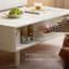 Table basse à porte coulissante en bois massif