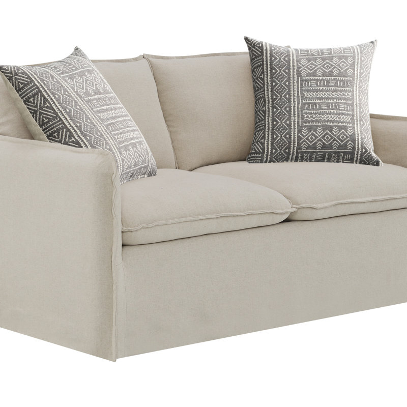Tissu avec motif Upendo, causeuse beige Yakety Yak et lin beige avec 2 coussins décoratifs