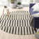 Arzilla Striped Ivory/Black Area Rug