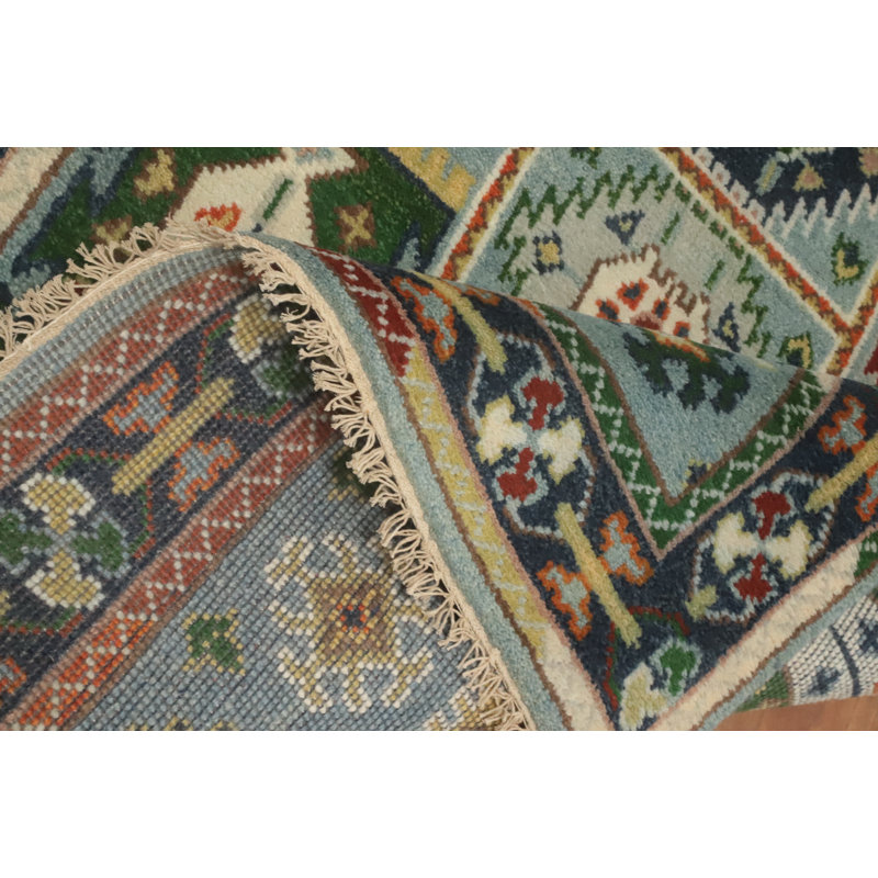 Tapis géométrique bleu clair fait à la main 4 x 6