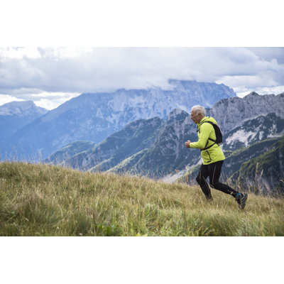Senior Man Jogging In The Mountains by Tomazl - No Frame Print on Canvas