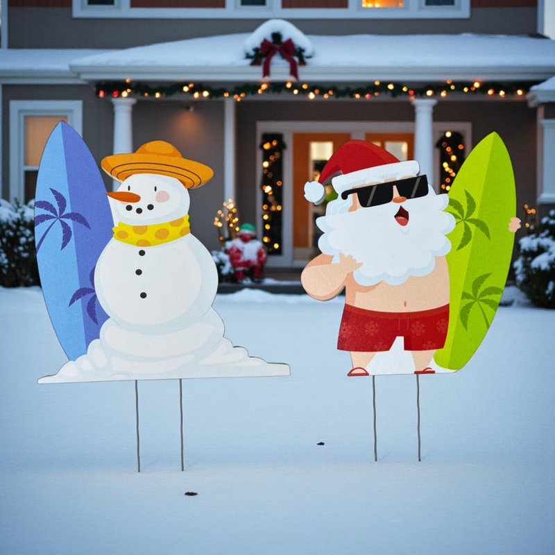 Panneaux de jardin sur le thème du surf côtier avec le père Noël et le bonhomme de neige
