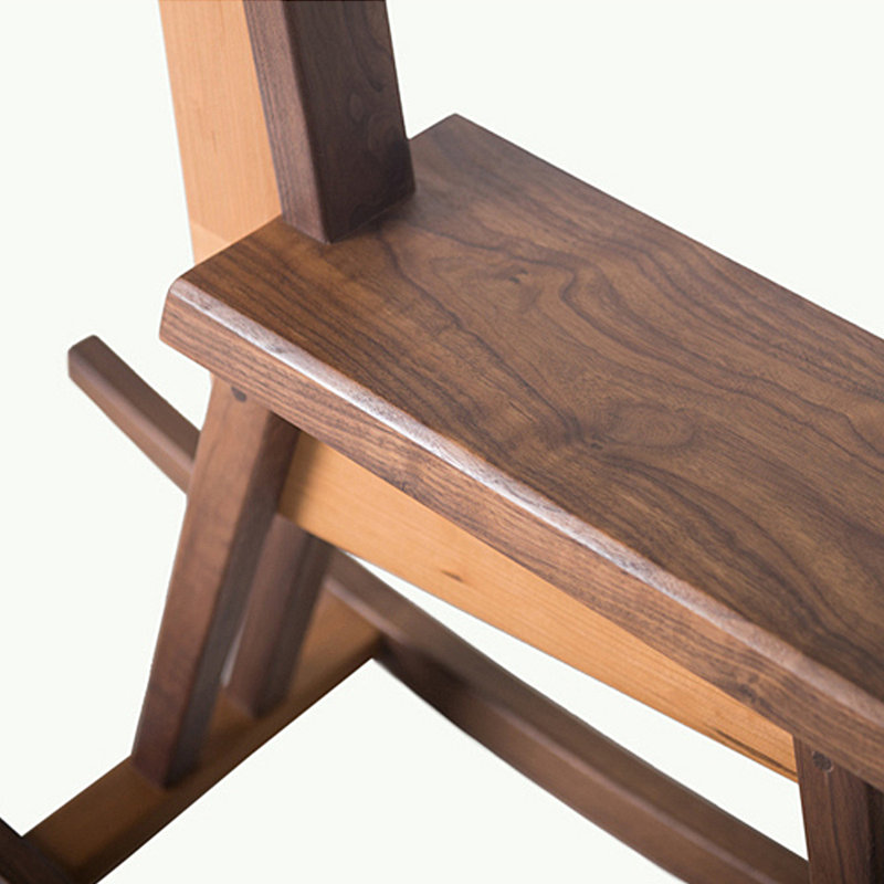 Chaise berçante en bois massif cerisier noir