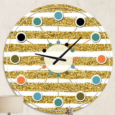 Horloge murale dorée à lignes horizontales dorées