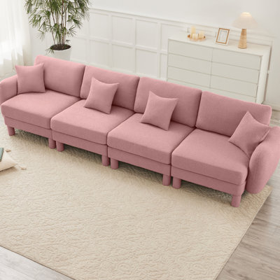 4 - Seater Boucle Fabric Couch With Construction And Soft Seat Configuration For Regular Use Elegantly Curved Dense Foam A Relaxing Lounge Area