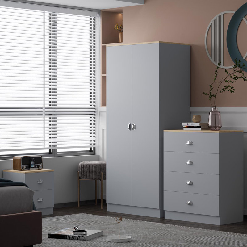 Easher 3 Piece Bedroom Furniture Set. 2 Door Wardrobe. 4 Drawer Chest Of Drawers. 2 Drawer Bedside Table. Matt Finish, Oak Effect Top. Polished Chrome Cup Handles