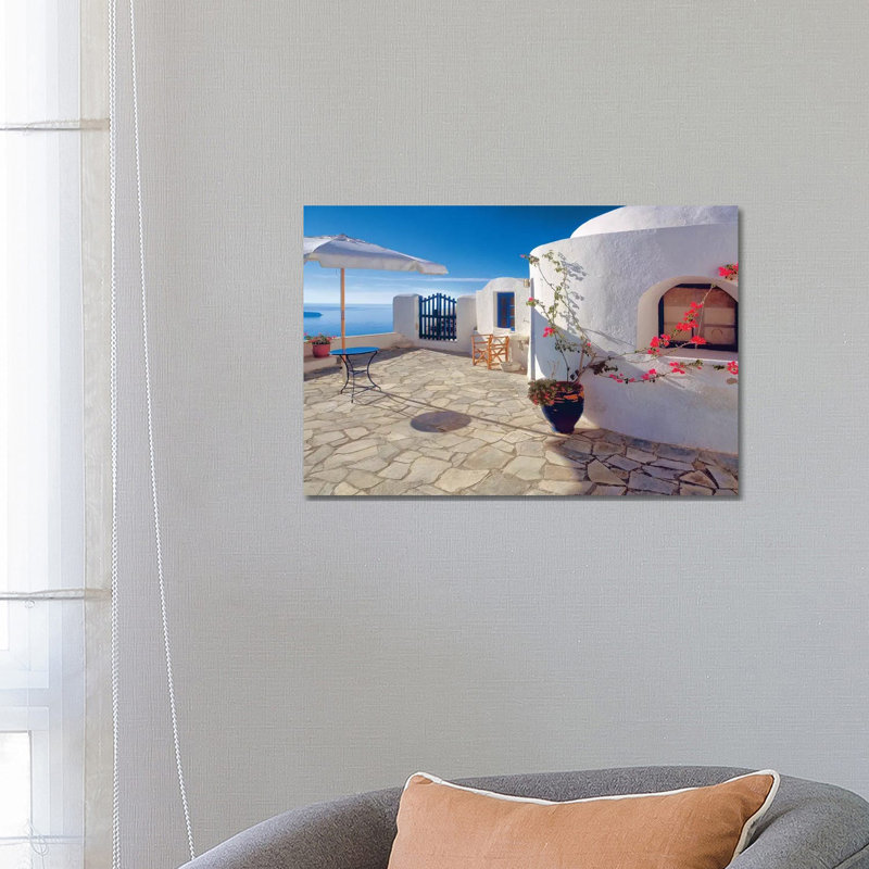 Greece, Santorini, Oia. House Balcony With Ocean View. by Jaynes Gallery - Wrapped Canvas Print