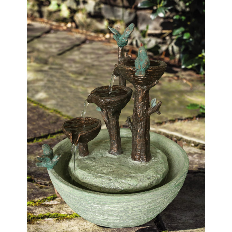 Fontaine d'oiseaux jouant à l'intérieur pour la table