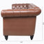 Canapé Chesterfield en polyuréthane à accoudoirs roulés.-114427252