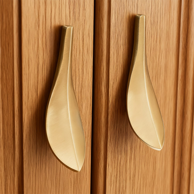 Poignée fantaisie feuille d'or 