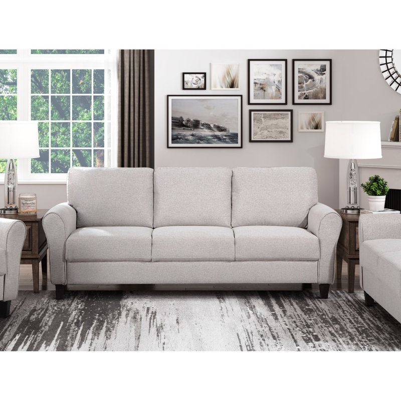 Mobilier de salon de style moderne et transitionnel revêtu de tissu texturé de couleur sable