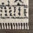 Adein Shaggy Farmhouse Beige/Black Area Rug-651545515