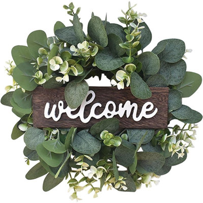 Couronne d'eucalyptus vert avec signe de bienvenue