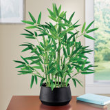 Plante de bambou artificielle réaliste dans un pot noir