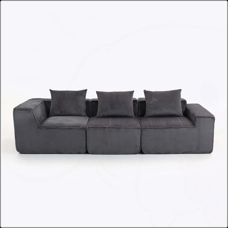Canapé modulaire désossé à compression en velours côtelé luxueux, pouvant être combiné à plusieurs personnes et doté d'une esthétique moderne.
