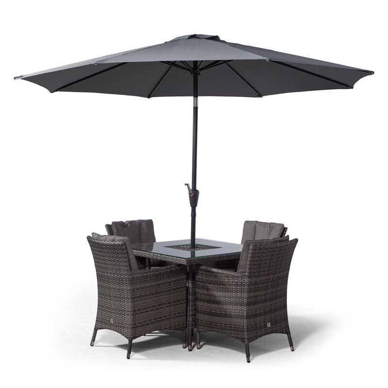 Karcher 4 - Person Wicker Patio Dining Set with Square Table , Cushions Included, Grey