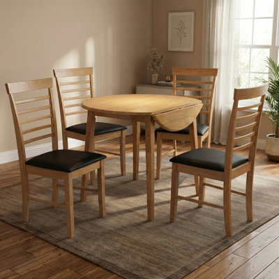 Bowerbank Extendable Round Solid Wood Dining Table