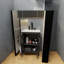 Meuble-lavabo moderne noir avec lavabo en céramique, solution de rangement compacte