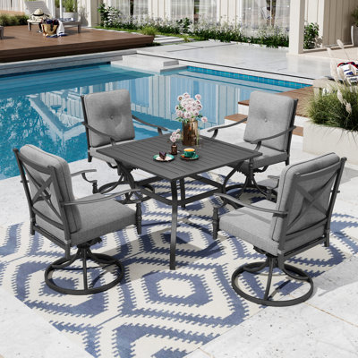 4-Person Steel Patio Dining Set With Textilene Sling Swivel Chairs And Cushions