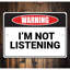 Panneau en aluminium «Not Listening»-58278669
