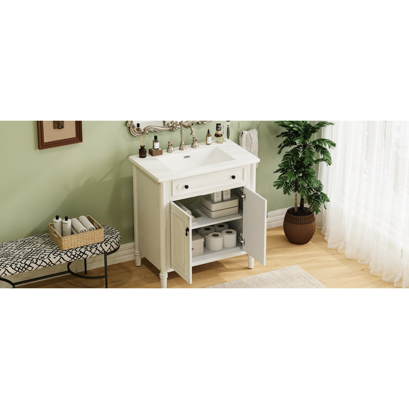 Meuble-lavabo blanc 31 po avec portes à fermeture en douceur, tablettes réglables et faux tiroir pour un rangement confortable et fonctionnel de 31 po