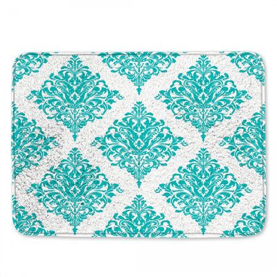 Tapis de bain turquoise à motif damassé