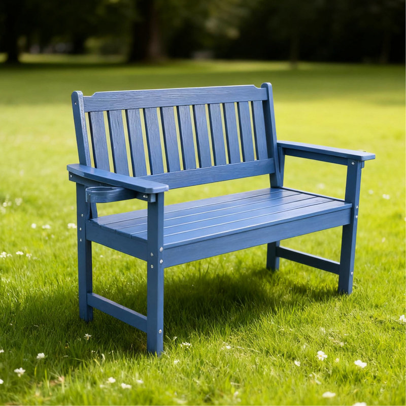 Banc bleu foncé avec structure stable et ergonomique pour les décors extérieurs