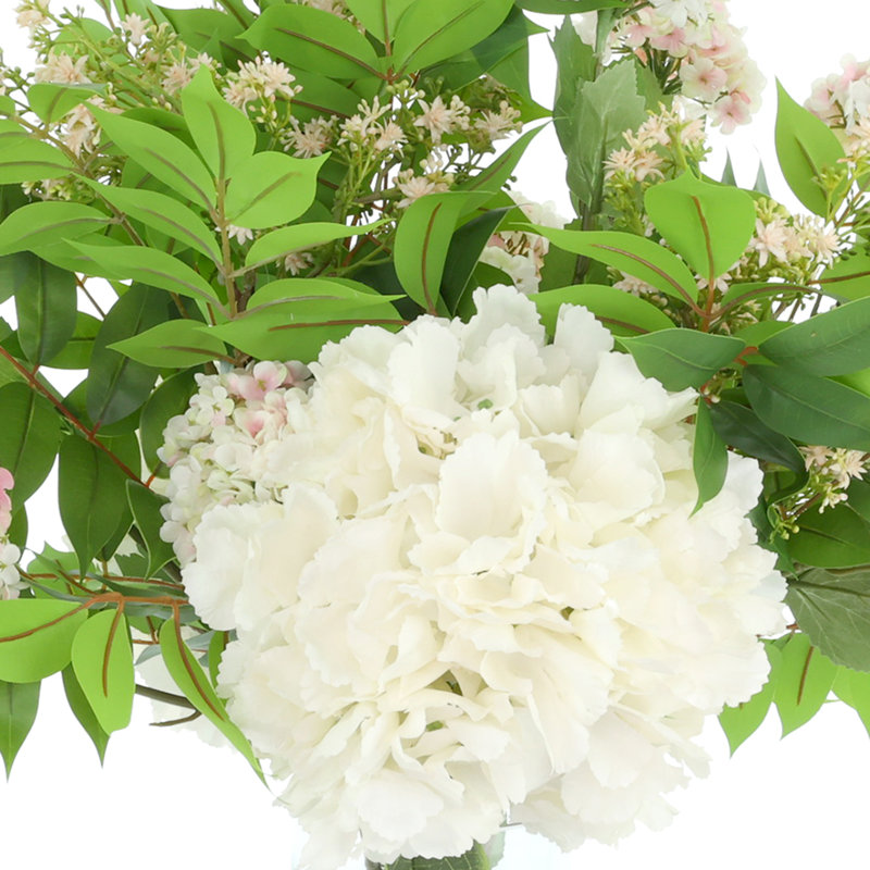Hydrangeas and Viburnum Arranged in a Glass Vase