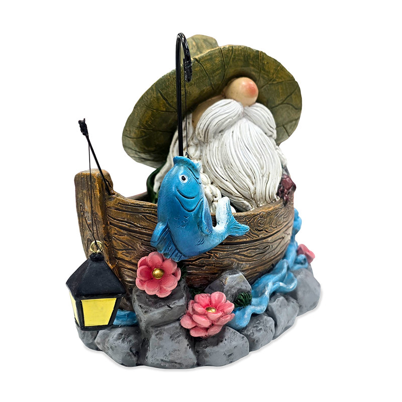 Gnome de pêche avec lanterne