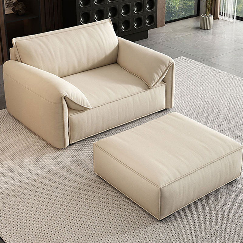Chaise avec accoudoirs coussinée beige en polyester avec repose-pieds