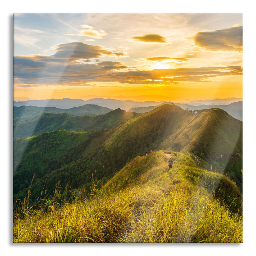 Glasbild Gebirgszug bei Sonnenuntergang