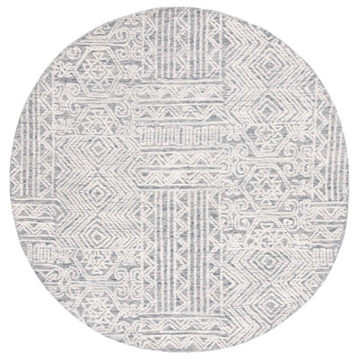 Amzi Hand Tufted Wool Southwestern Rug