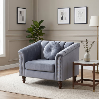 Light Blue Upholstered Armchair with Channel Tufting, Rolled Arms and Nailhead Trim